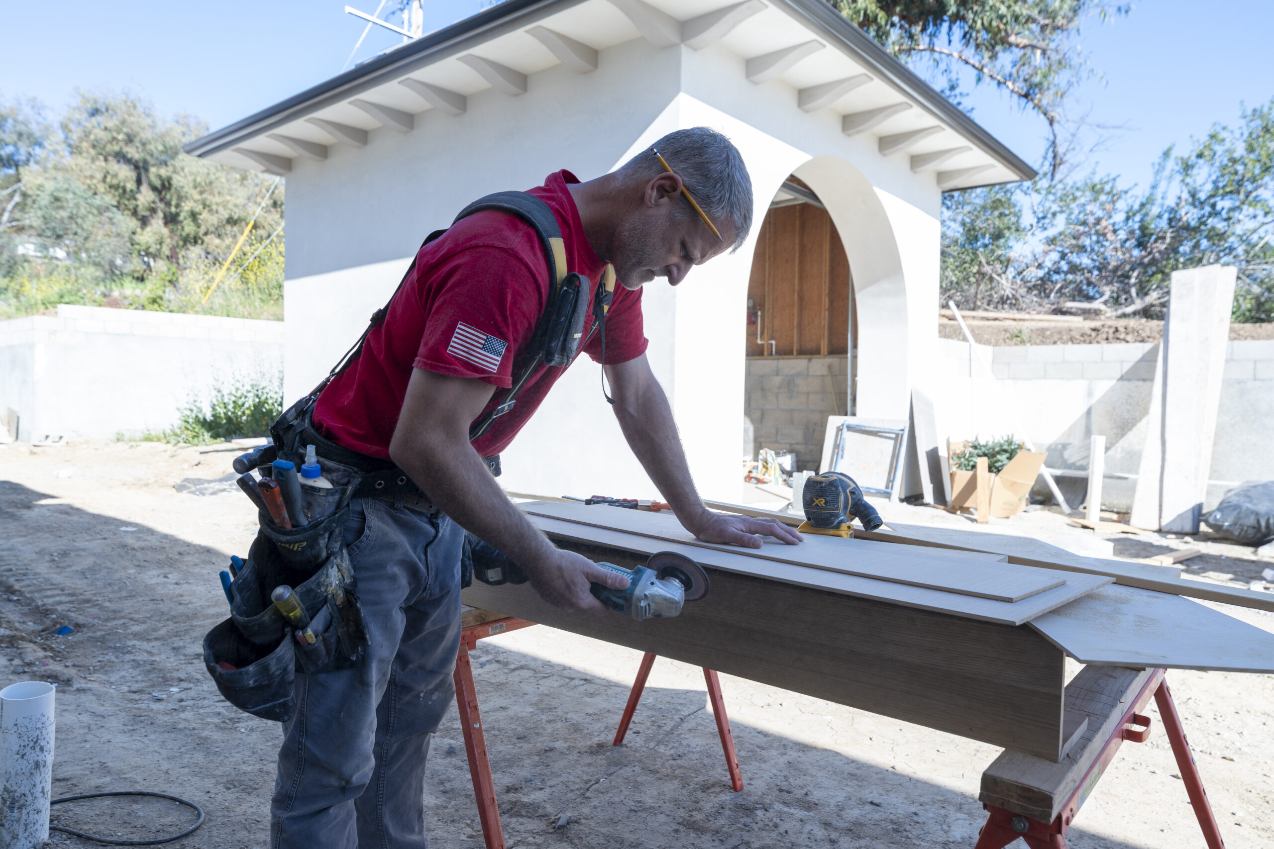 Youngren Tradeworks installer hard at work on a window installation