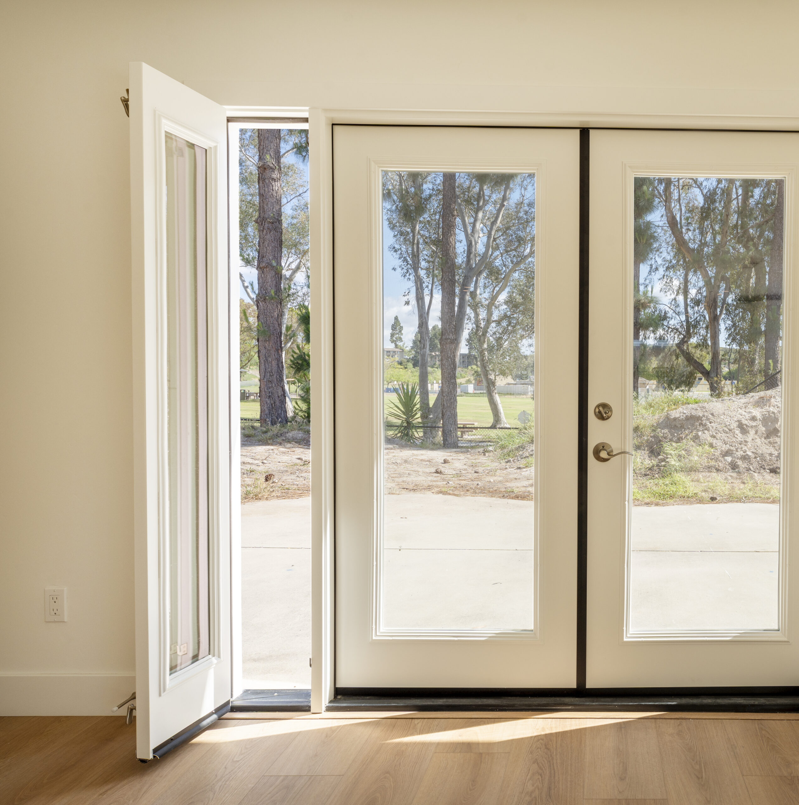 04272026_Youngren_Lucht_remodel_completed_DSC06554 Beautiful french doors with side panel openings by Youngren Tradeworks