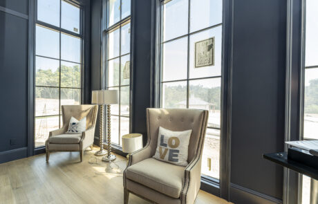 Custom wall panels between windows in a client's home.